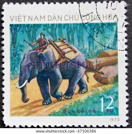 Vietnam - CIRCA 1973: A stamp shows man on elephant circa 1973