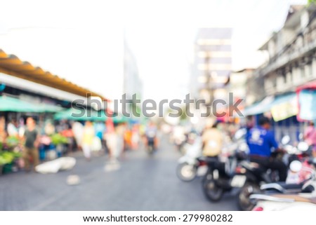 A crowd of people moving on the old town city street defocused blurred abstract image at phuket thailand