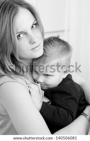 mother hugging son