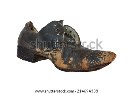 ragged old shoe isolated on a white background