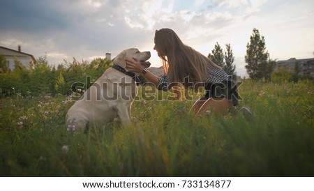 Similar – Image, Stock Photo Woman caressing dog at home
