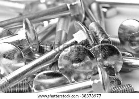 close up heap of  bolts and nuts