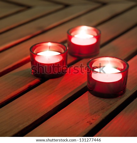 three candles lighting for a relaxing ambiance