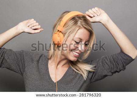 pretty young woman enjoying good vibes on headphones