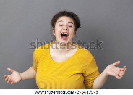 energetic 20s big woman acting thrilled, wearing colorful sweater, expressing joy and excitement with hand gesture
