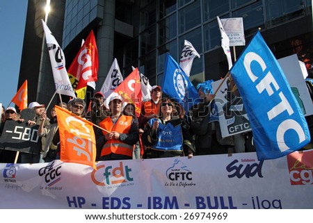 PARIS - MARCH 19: Private and public sector trade unions demonstrate during France\'s nationwide strike, to demand salary rise and protection form the crisis, on March 19, 2009, in Paris, France