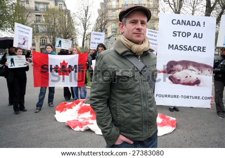 PARIS - MARCH 26: French Fourrure Torture activists protest on the streets of Paris on March 26, 2009 against Canadian commercial seal hunt, which began on March 23 off the East Coast of Canada