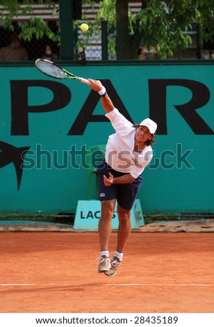 PARIS - MAY 23: Argentina\'s professional tennis player Eduardo Schwank serves during the match at French Open, Roland Garros, May 23, 2008 in Paris, France.