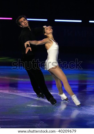 PARIS - OCTOBER 18: Jessica DUBE and Bryce DAVISON of Canada perform at the Gala event of the ISU Grand Prix Eric Bompard Trophy at Palais-Omnisports de Bercy October 18, 2009 in Paris, France.