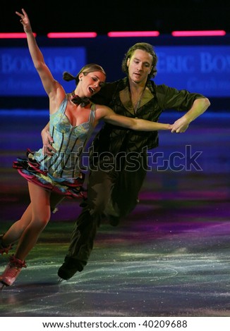 PARIS - OCTOBER 18: Nathalie PECHALAT and Fabian BOURZAT of France perform at the Gala event of the ISU Grand Prix Eric Bompard Trophy at Palais-Omnisports de Bercy October 18, 2009 in Paris, France.