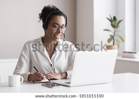 Similar – Image, Stock Photo Content young black lady reading notes while lying on bed