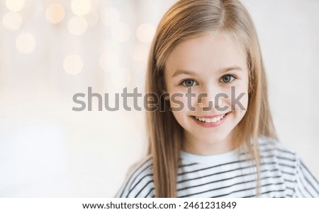 Similar – Image, Stock Photo Portrait of a little laughing beautiful girl on nature on summer day vacation. child in dress is playing in the green park at the sunny time. The concept of family holiday and time together