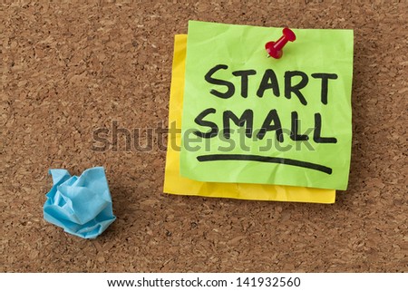 start small -  business advice - handwriting on green sticky note