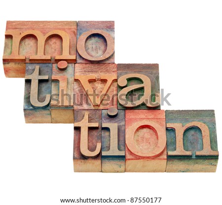 motivation word - isolated abstract in vintage wood letterpress printing blocks
