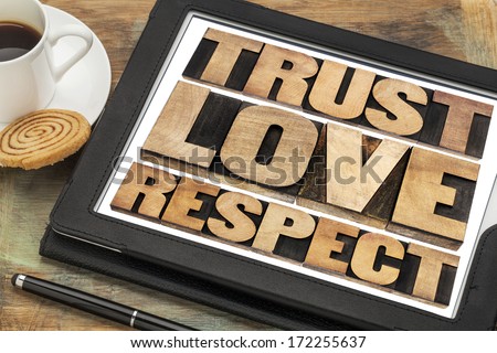 trust, love and respect word abstract in vintage letterpress wood type on a digital tablet