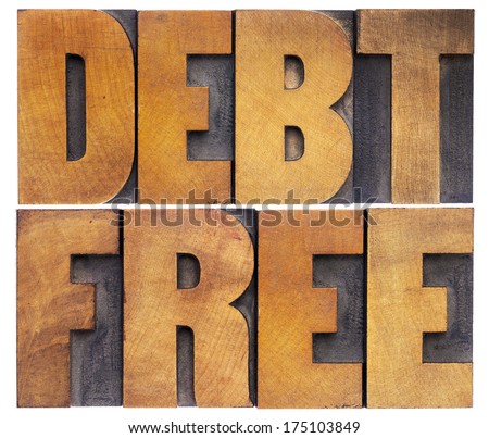 debt free - financial concept - isolated text in vintage letterpress wood type