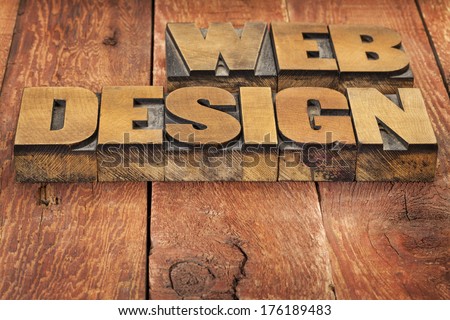 web design  -  text in vintage letterpress wood type against rustic red painted ban wood