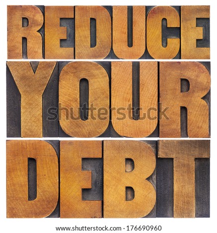 reduce your debt - financial concept - isolated text in vintage letterpress wood type