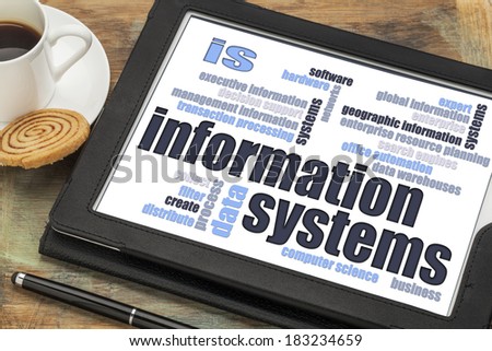 information systems word cloud on a digital tablet with a cup of coffee