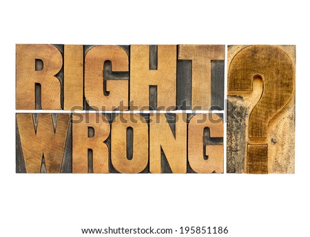 right or wrong ethical choice  dilemma - isolated vintage wood letterpress printing blocks