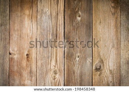 rustic weathered wood background with grain and knots (vertical planks)