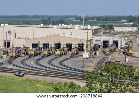 NORTH PLATTE, NEBRASKA, JULY 14, 2014:  A locomotive repair shop in Union Pacific\'s Bailey rail yard from Golden Spike Tower. The world\'s largest train yard is handling 10,000 cars each day.