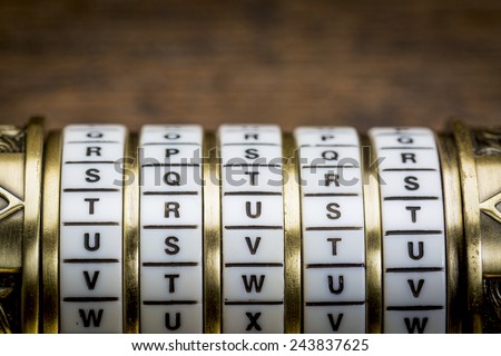 trust word as a password to combination puzzle box with rings of letters