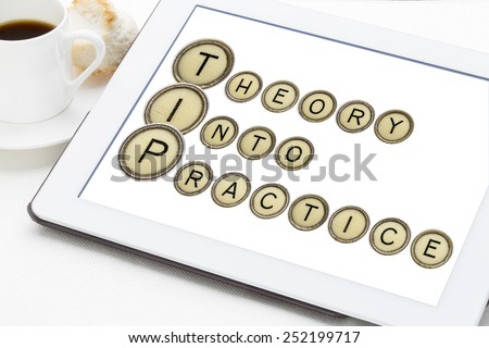 TIP (theory into practice) acronym explained with old typewriter keys on a digital tablet with a cup of coffee