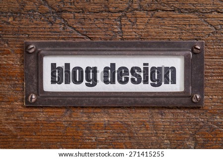 blog design  - file cabinet label, bronze holder against grunge and scratched wood