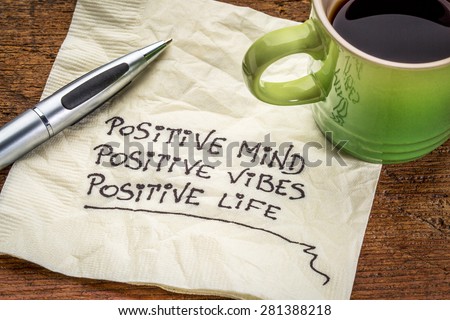 positive mind,  positive vibes, positive life - motivational handwriting on a napkin with a cup of coffee