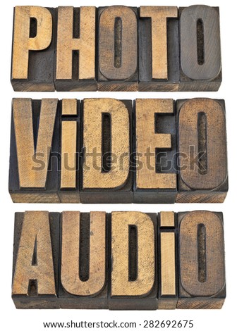 photo, video, audio words  - multimedia concept - a collage of isolated text in vintage letterpress wood type
