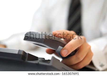 businessman is answering the phone