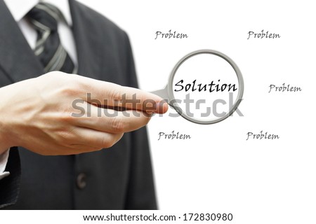 Problem and Solution - Business Concept with businessman and magnifying glass