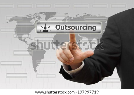 Outsourcing. Businessman pressing Outsourcing virtual button
