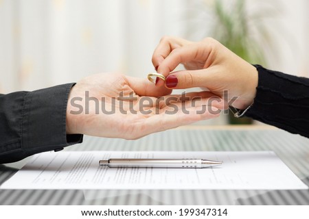 woman returned wedding ring to  husband . Divorce concept