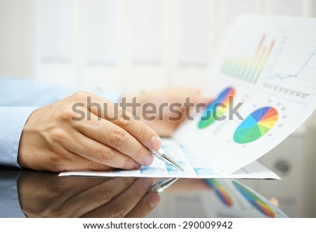 businessman is analyzing business and financial  data