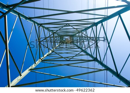 Electrical tower on a background of the blue sky