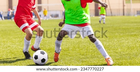 Similar – Image, Stock Photo Anonymous sportsman jumping on trial bike during workout