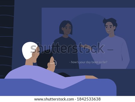 A young gay couple cuddling and watching a movie on a video projector, a lockdown leisure