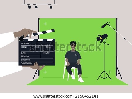 A chroma key screen in a movie studio, A young male African character sitting on a chair, a confident handsome actor being filmed in a video