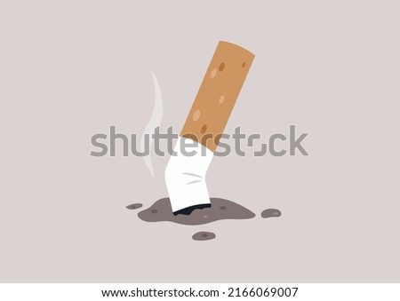 A crushed cigarette butt on the ground, unhealthy habits, a smoking concept