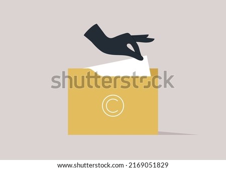 Intellectual property fraud, A hand stealing a sheet of paper from a folder with a big copyright sign Сток-фото © 