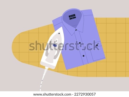 A folded shirt and an iron on an ironing board, household chores, daily routine