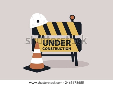 A construction zone is marked with a safety sign, cone, and hard hat