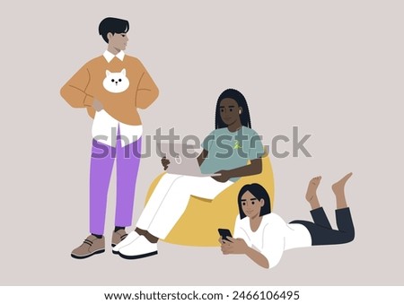 Three teenagers casually hang out; one uses a laptop on a yellow bean bag, another lays on the floor with a smartphone, while a third stands nearby engaging in conversation