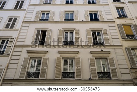 Facade of a residential block of apartments in Paris, France