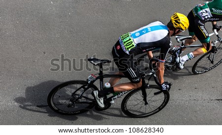 ROUEN, FRANCE -JUY 5: Upper view of the British cyclist Bradley Wiggins (Sky Procycling Team) riding to the start line of the stage 5 of Le Tour de France in Rouen, France on July 5, 2012.