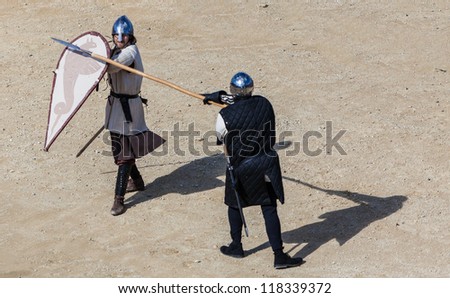 MONTMEDY,FRANCE,APRIL 29:  Bird eye view of two medieval unidentified men fighting during a historical reenactment festival  on 29 April 2012 in Montmedy, France.