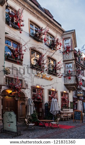 STRASBOURG, FRANCE- DEC 28: Street aspect with decorated buildings during the winter illumination on December 28 2011 in Strasbourg.In winter here is held a famous Christmas market and illumination.