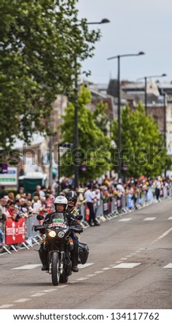 SAINT QUENTIN,FRANCE, JUL 5:Bike of journalists from the sports magazine L\'Equipe passing before the arrival of the peloton in the stage 5 of Le Tour de France on July 5 2012 in Saint Quentin  .
